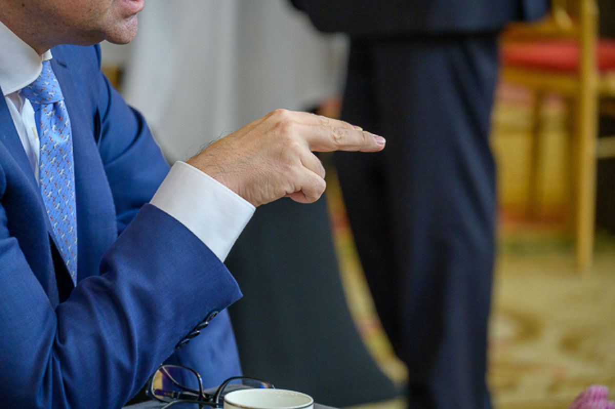 Speaker gesture during business discussion